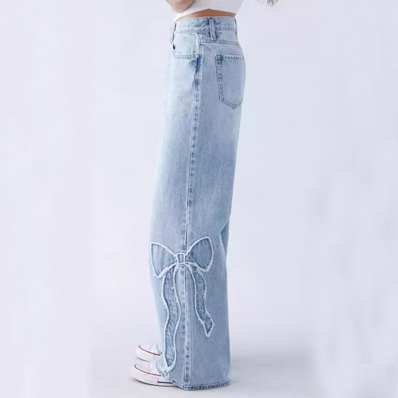 Wiga Denim Trousers featuring Bow Embroidery