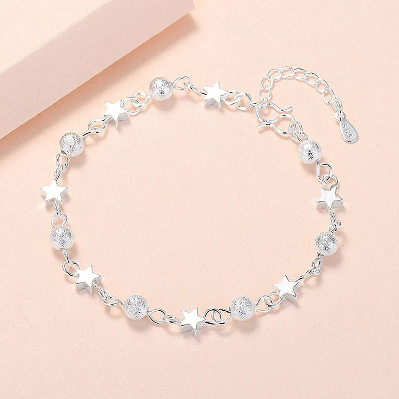 Women's bracelet with star charms