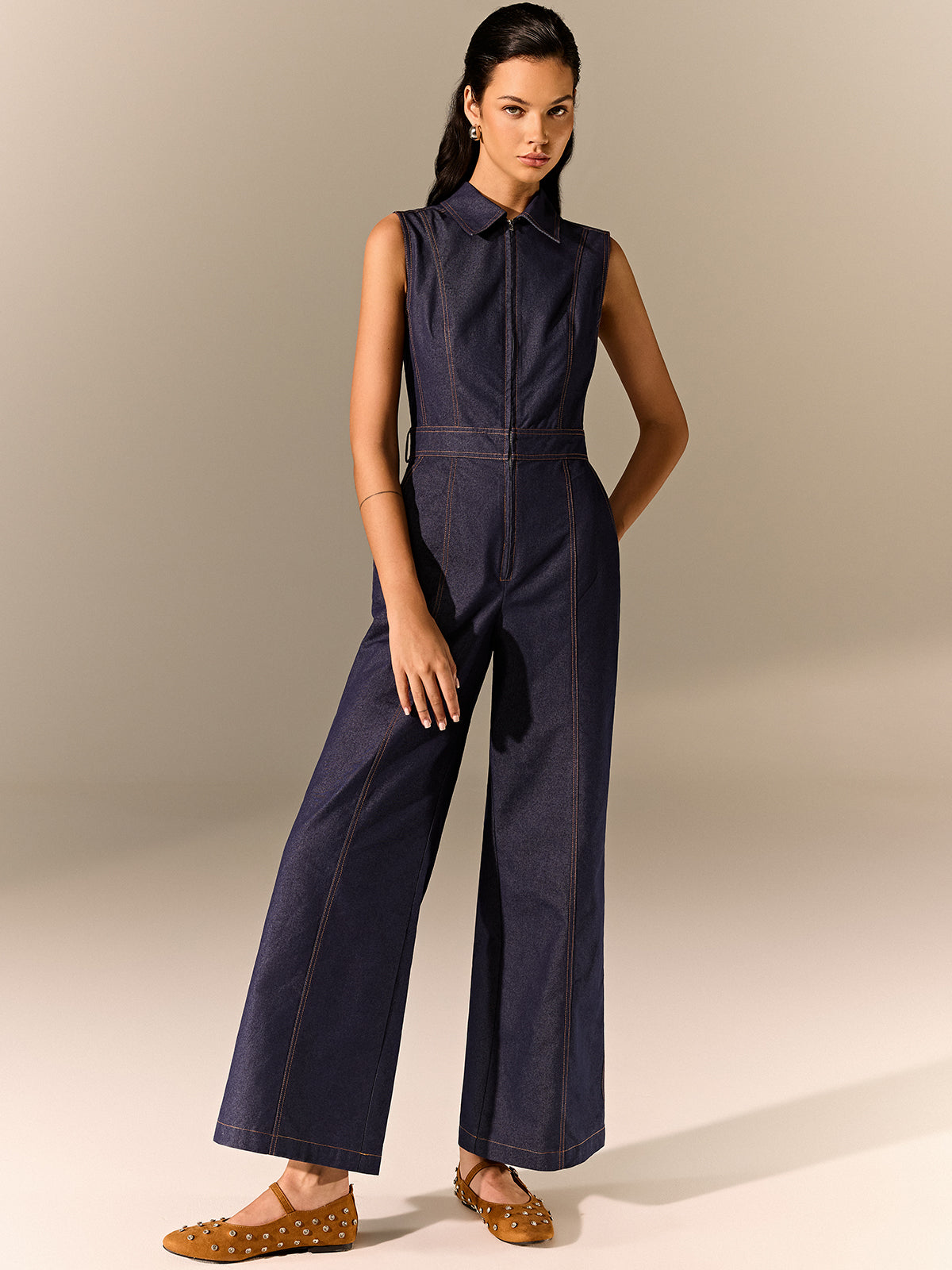 Women's jumpsuit made of denim with waist belt