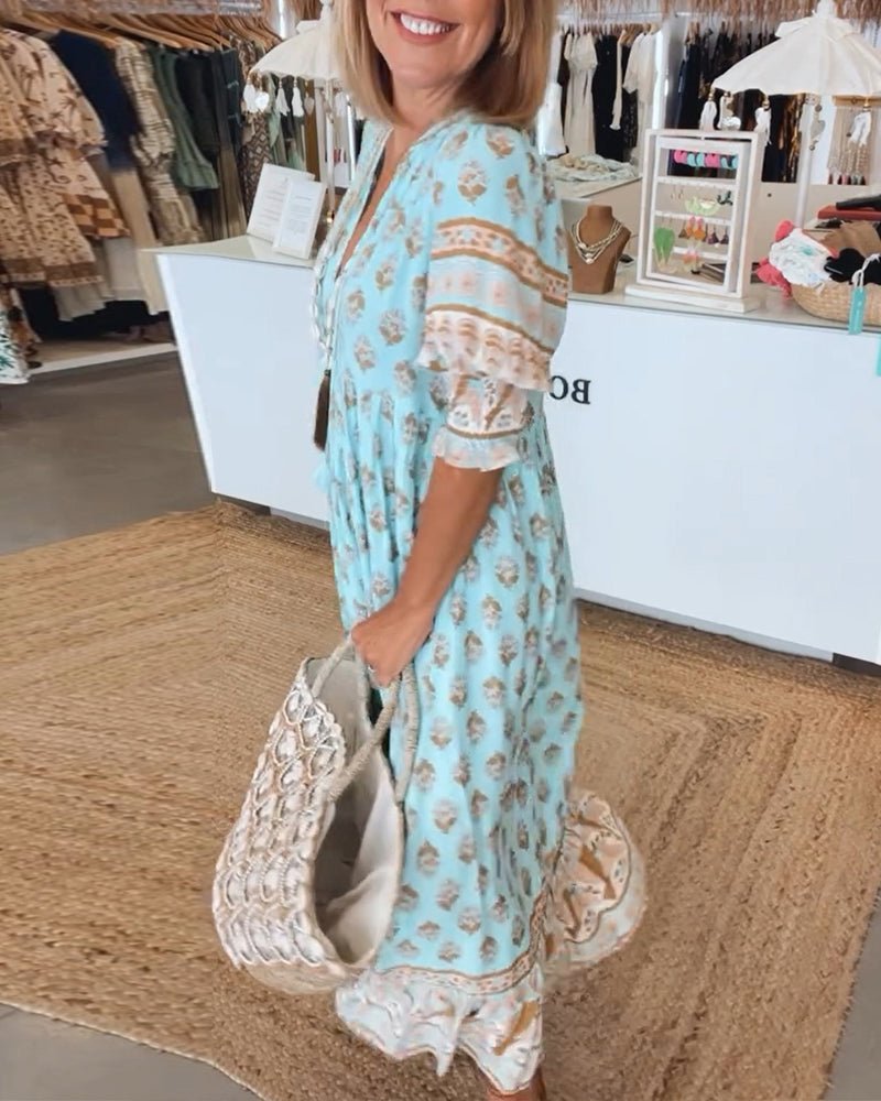 Chic Floral Midi Dress with Tassels
