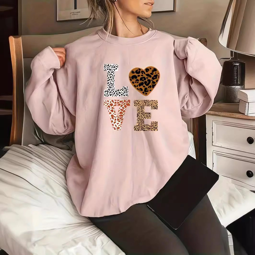 Women's sweater with crew neck and leopard pattern