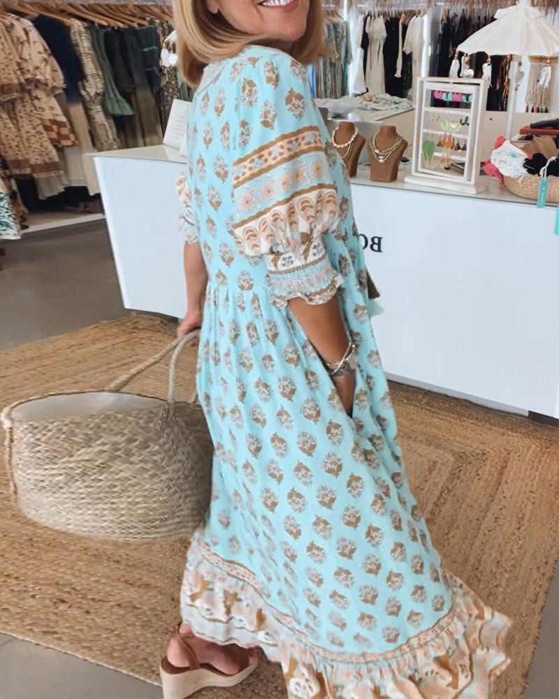 Chic Floral Midi Dress with Tassels