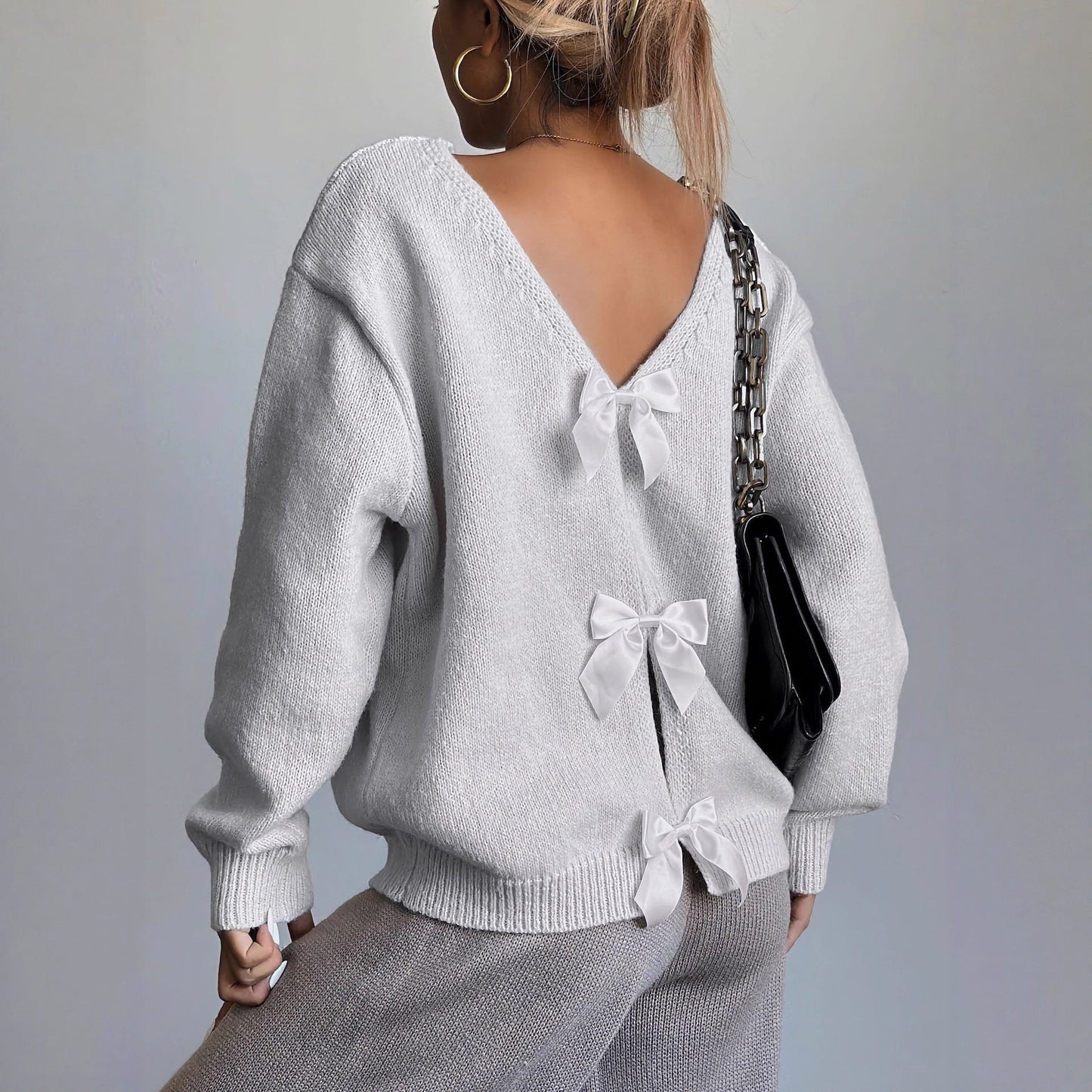 Women's sweater with back cutout