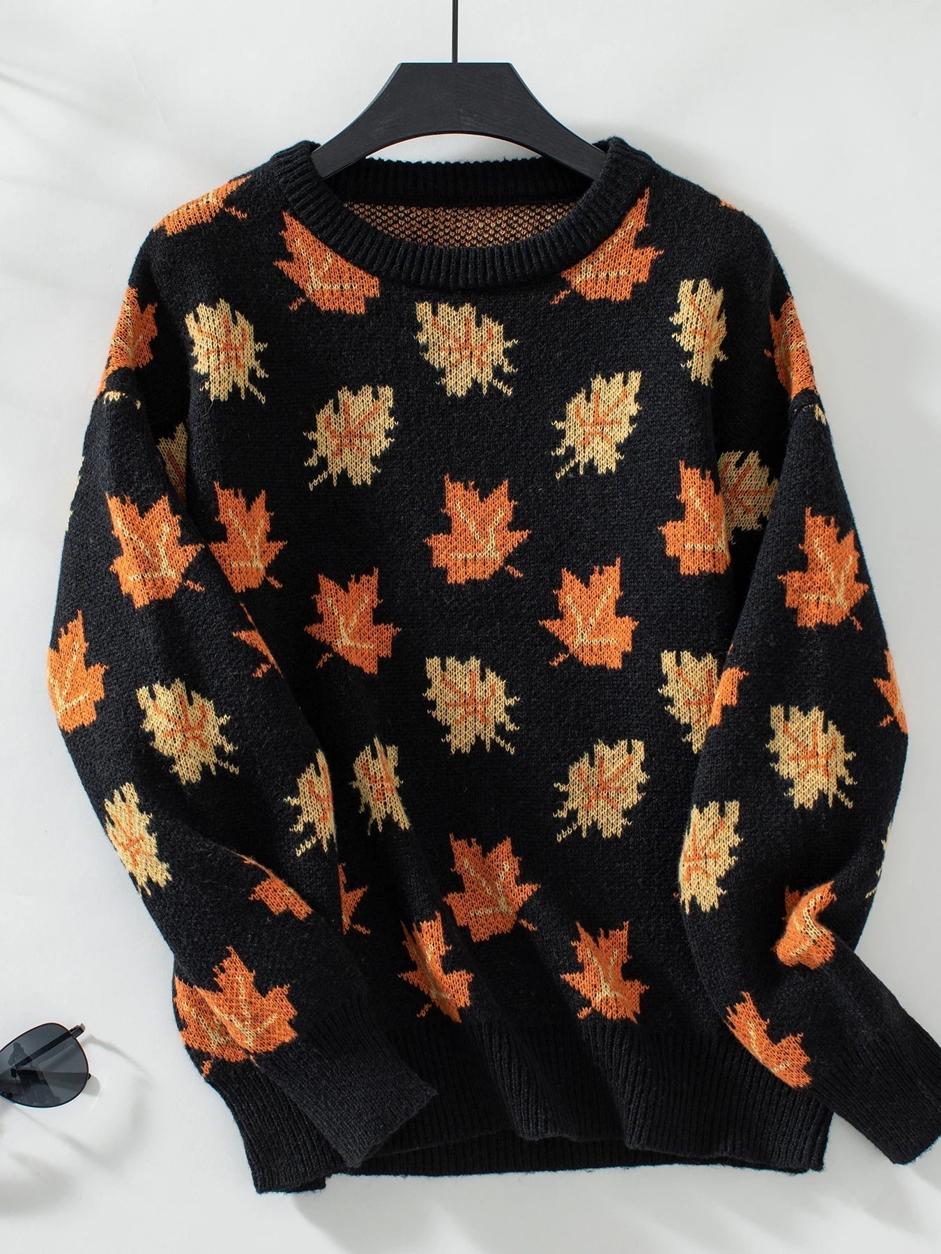 Warm women's sweater with leaf pattern