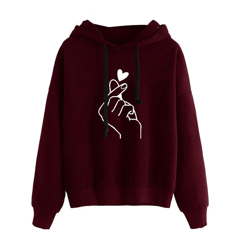 Women's fleece hoodie with finger heart motif