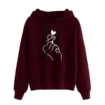 Women's fleece hoodie with finger heart motif