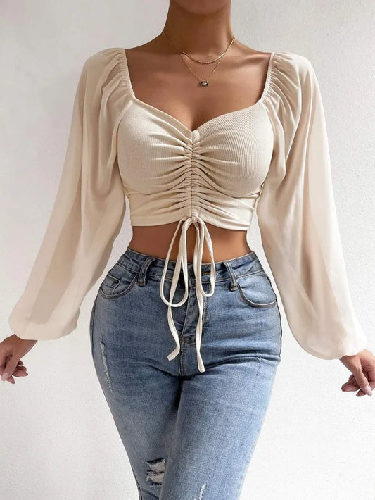 Women's top with puff sleeves and V-neckline
