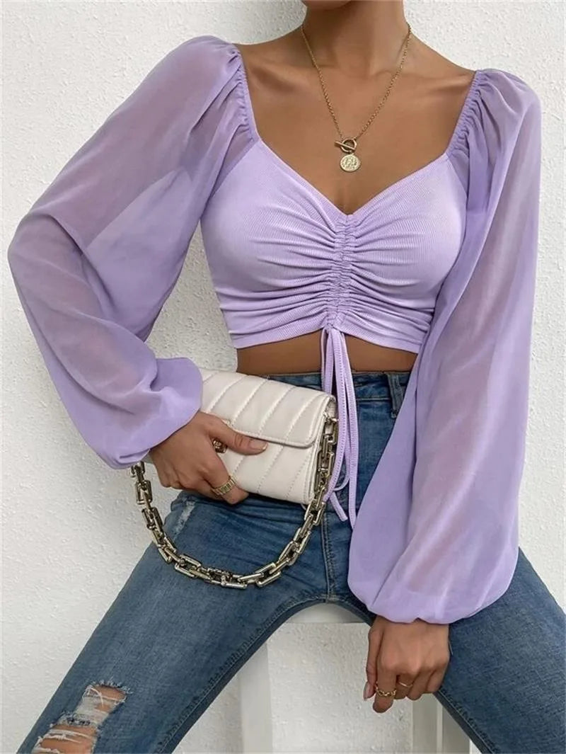 Women's top with puff sleeves and V-neckline