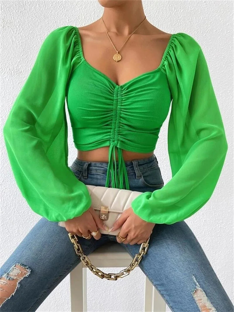 Women's top with puff sleeves and V-neckline