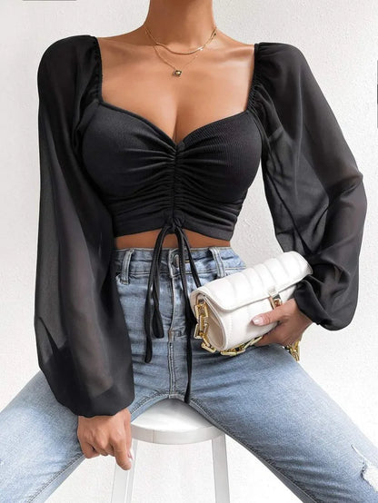 Women's top with puff sleeves and V-neckline