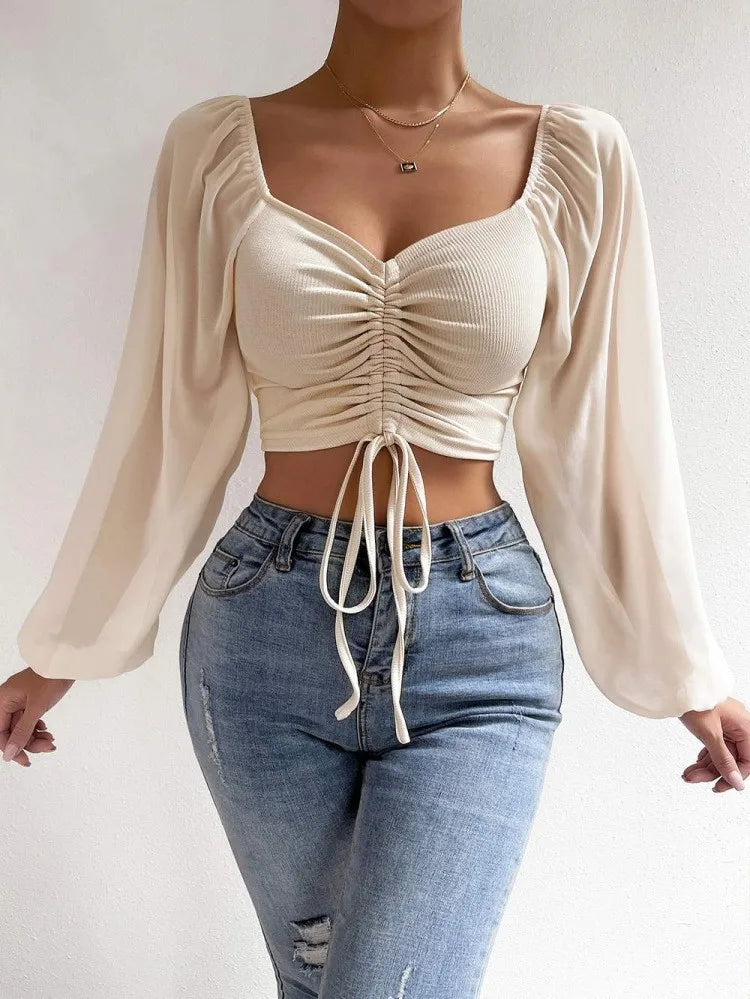 Women's top with puff sleeves and V-neckline