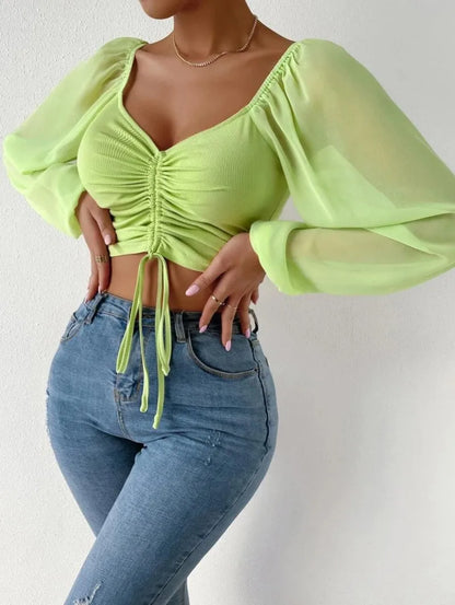Women's top with puff sleeves and V-neckline