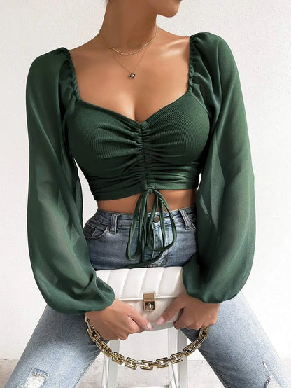 Women's top with puff sleeves and V-neckline