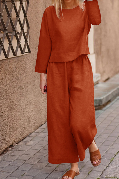 Airy linen ensemble with overlapping top and wide pant legs