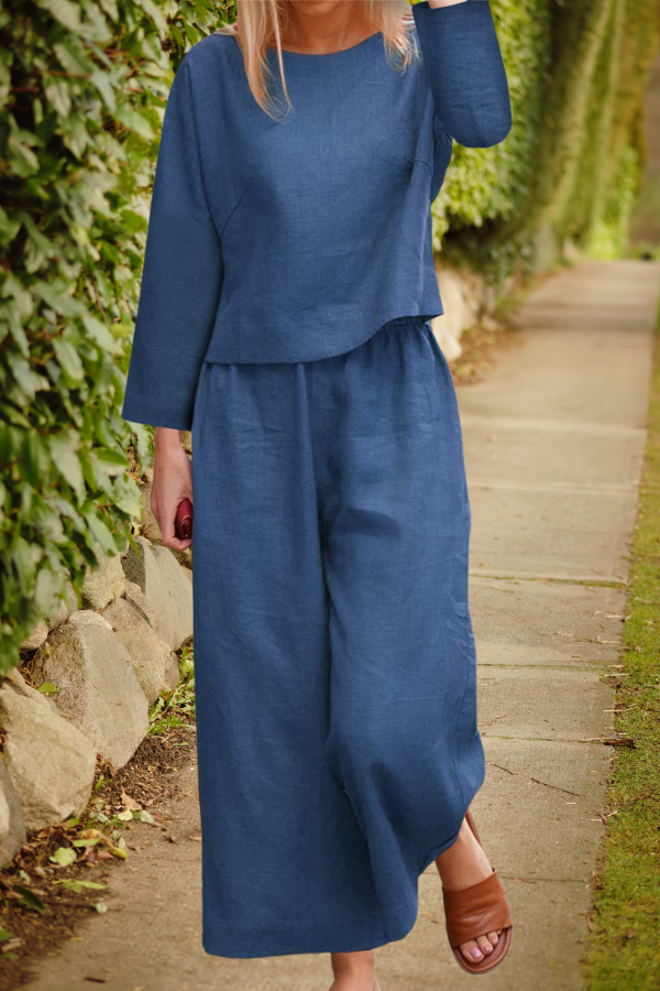 Airy linen ensemble with overlapping top and wide pant legs