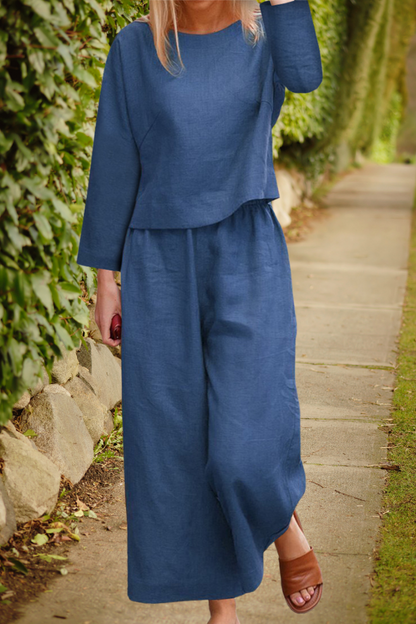 Airy linen ensemble with overlapping top and wide pant legs