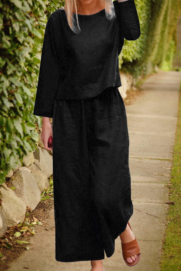 Airy linen ensemble with overlapping top and wide pant legs