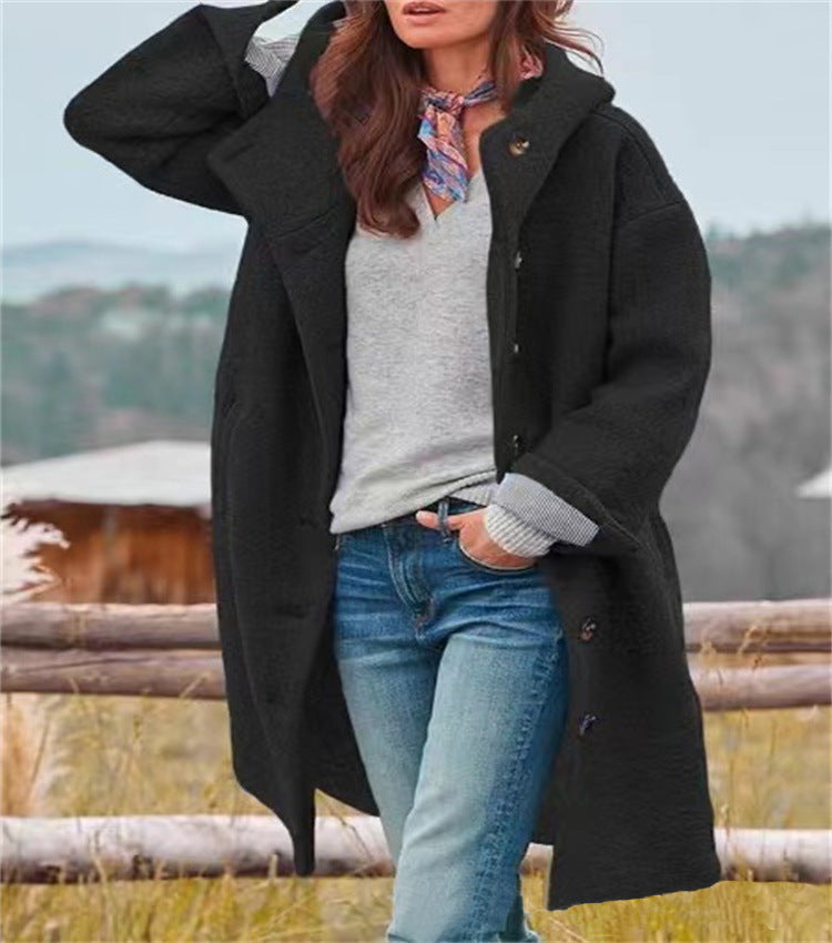 Women's oversized wool coat with practical button fastening Eloura-Fashion
