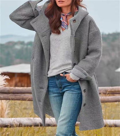 Women's oversized wool coat with practical button fastening Eloura-Fashion