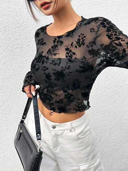Black knit top with long sleeves - elegant and stylish