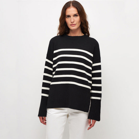 Warm women's striped oversized pullover for autumn and winter