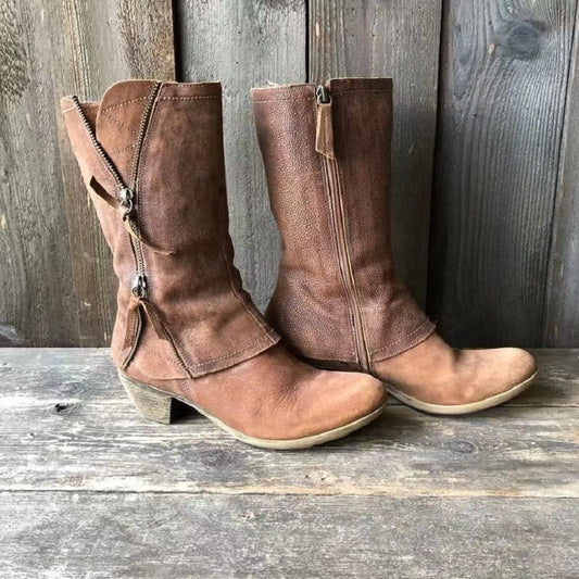 Vintage leather boots with decorative zippers