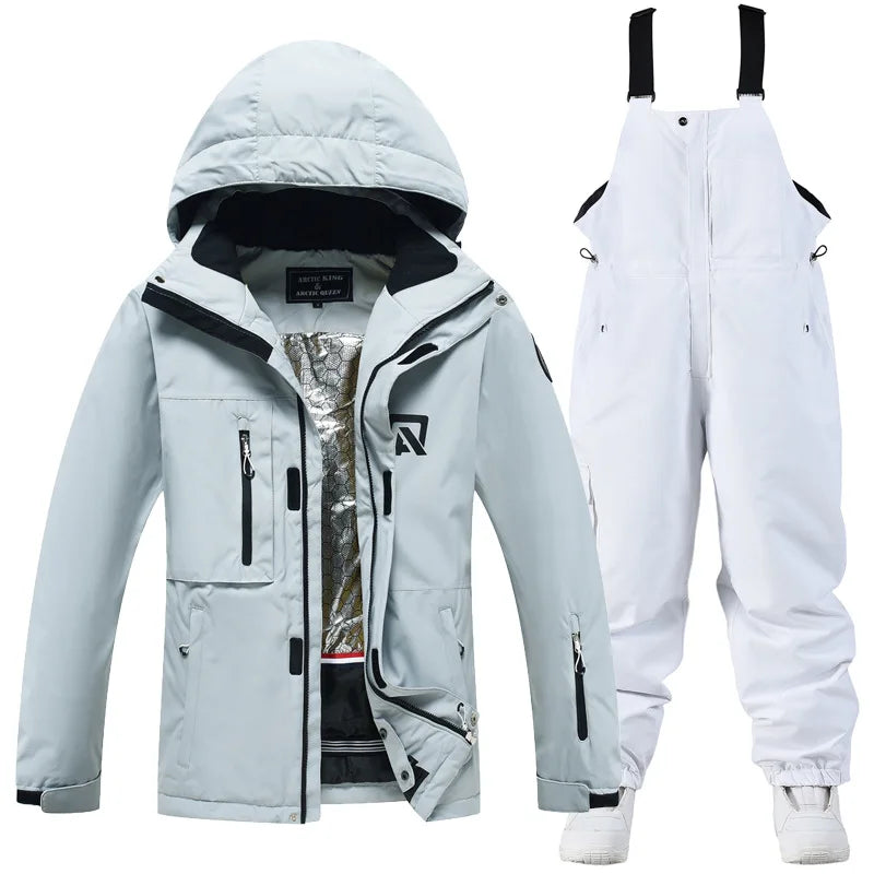Waterproof ski suit for women with suspenders