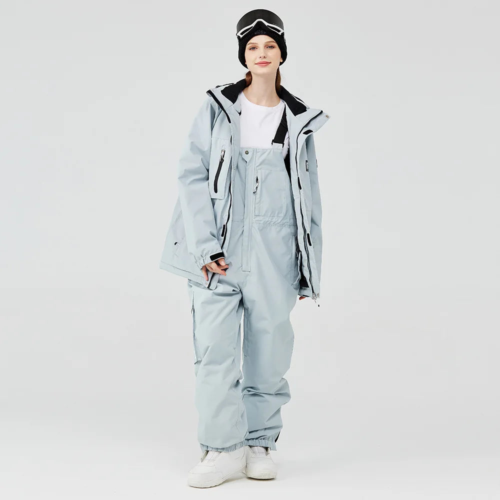 Waterproof ski suit for women with suspenders