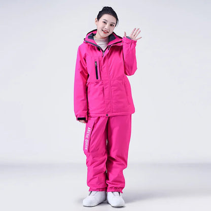 Waterproof ski suit for women with suspenders