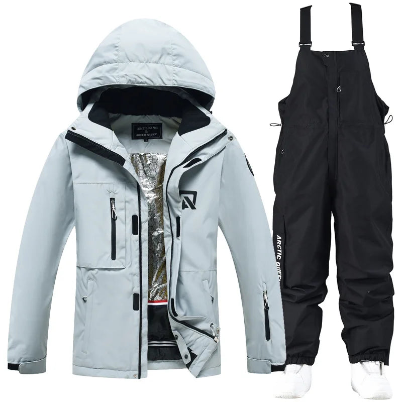 Waterproof ski suit for women with suspenders