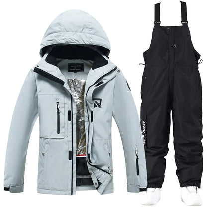 Waterproof ski suit for women with suspenders