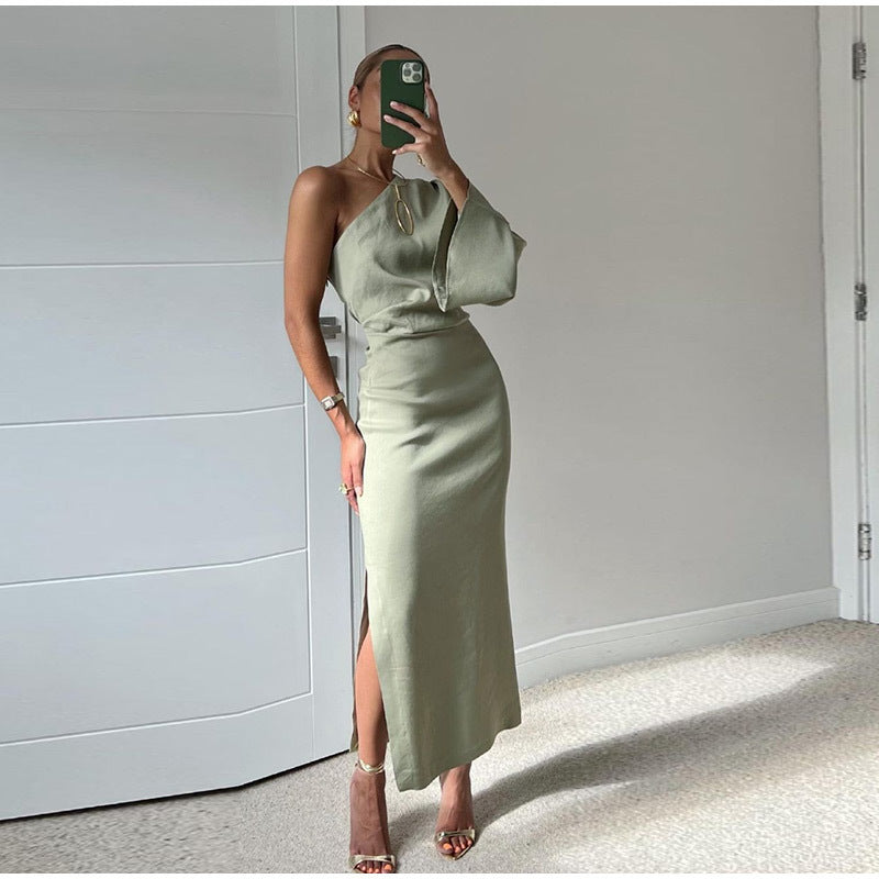 Asymmetrical midi dress with a slit and one sleeve