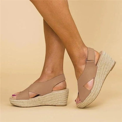 Wedge sandals with woven sole