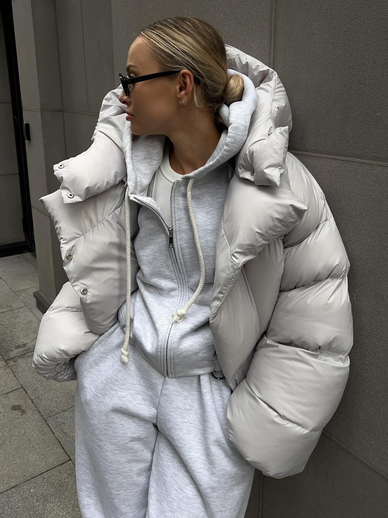 Winter quilted jacket with a large hood