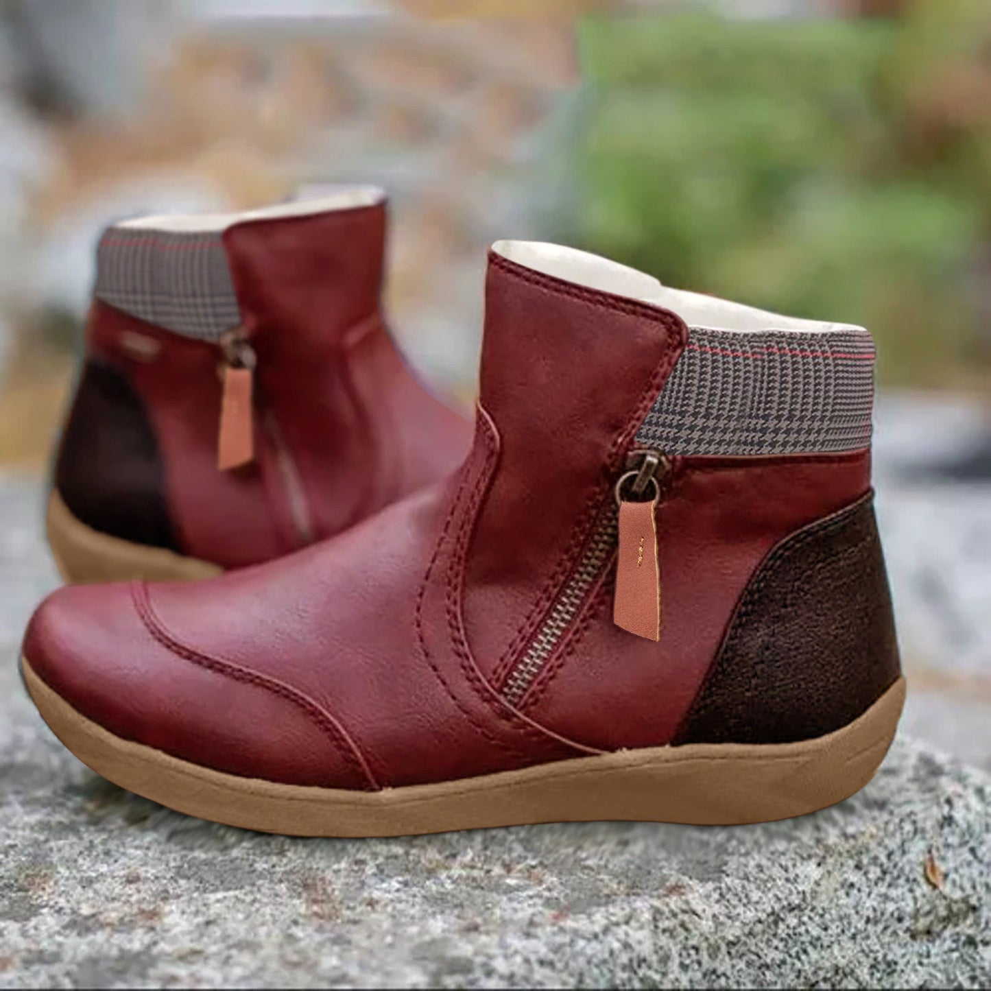 Black ankle boots with a zipper, insulation and checkered finish