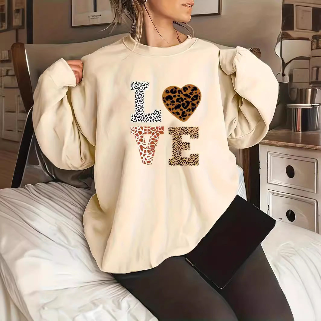 Women's sweater with crew neck and leopard pattern