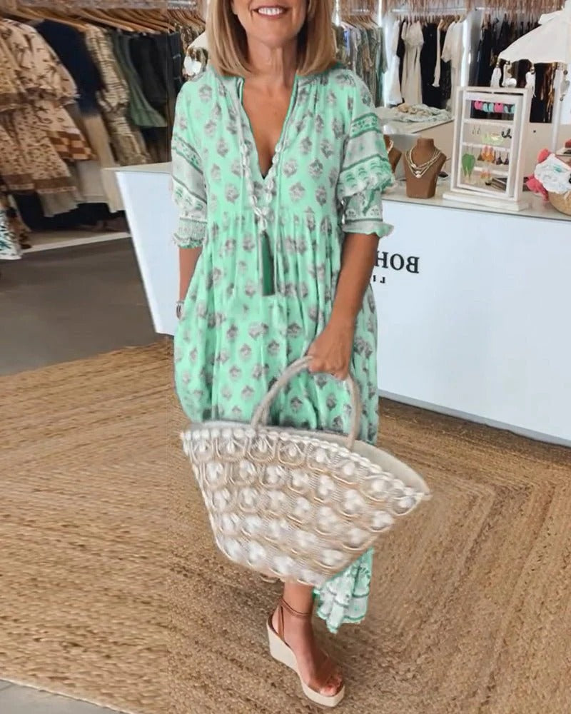 Chic Floral Midi Dress with Tassels