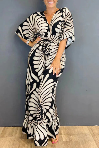 Vintage-style Sara jumpsuit with flounced sleeves and floral print